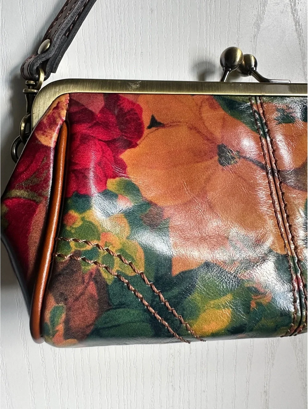 Patricia Nash Leather Wristlet with Retro Floral Print and Kiss Lock Closure
